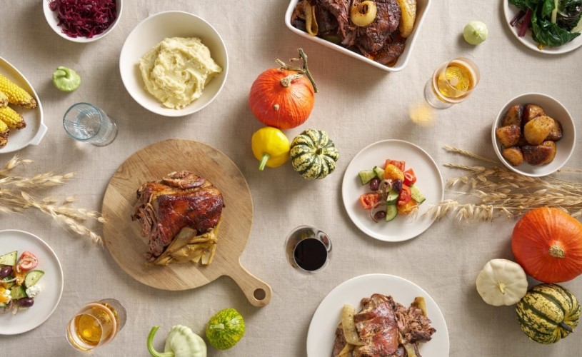 Meat and vegetables laid out on table